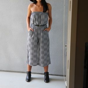 Strapless romper with pockets.